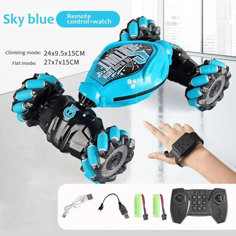 Toy robot with remote control and watch on a white background