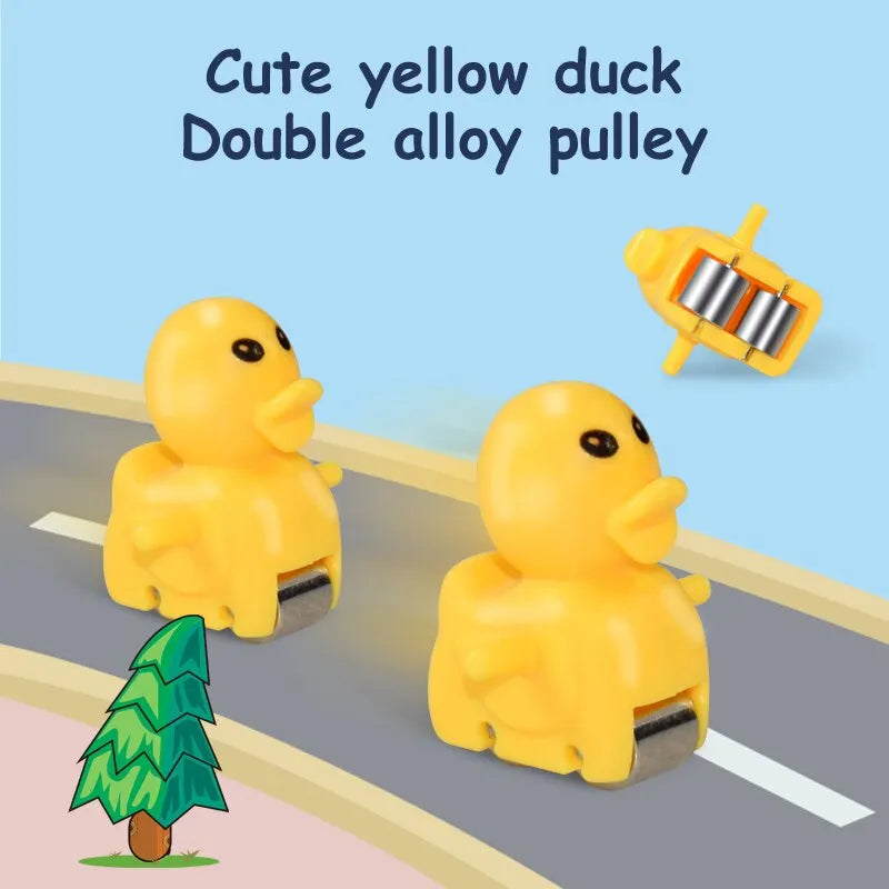 Two yellow duck-shaped double alloy pulleys on a track with a blue background.

